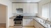 Kitchen at Sylvan Gardens Apartments in Van Nuys, CA